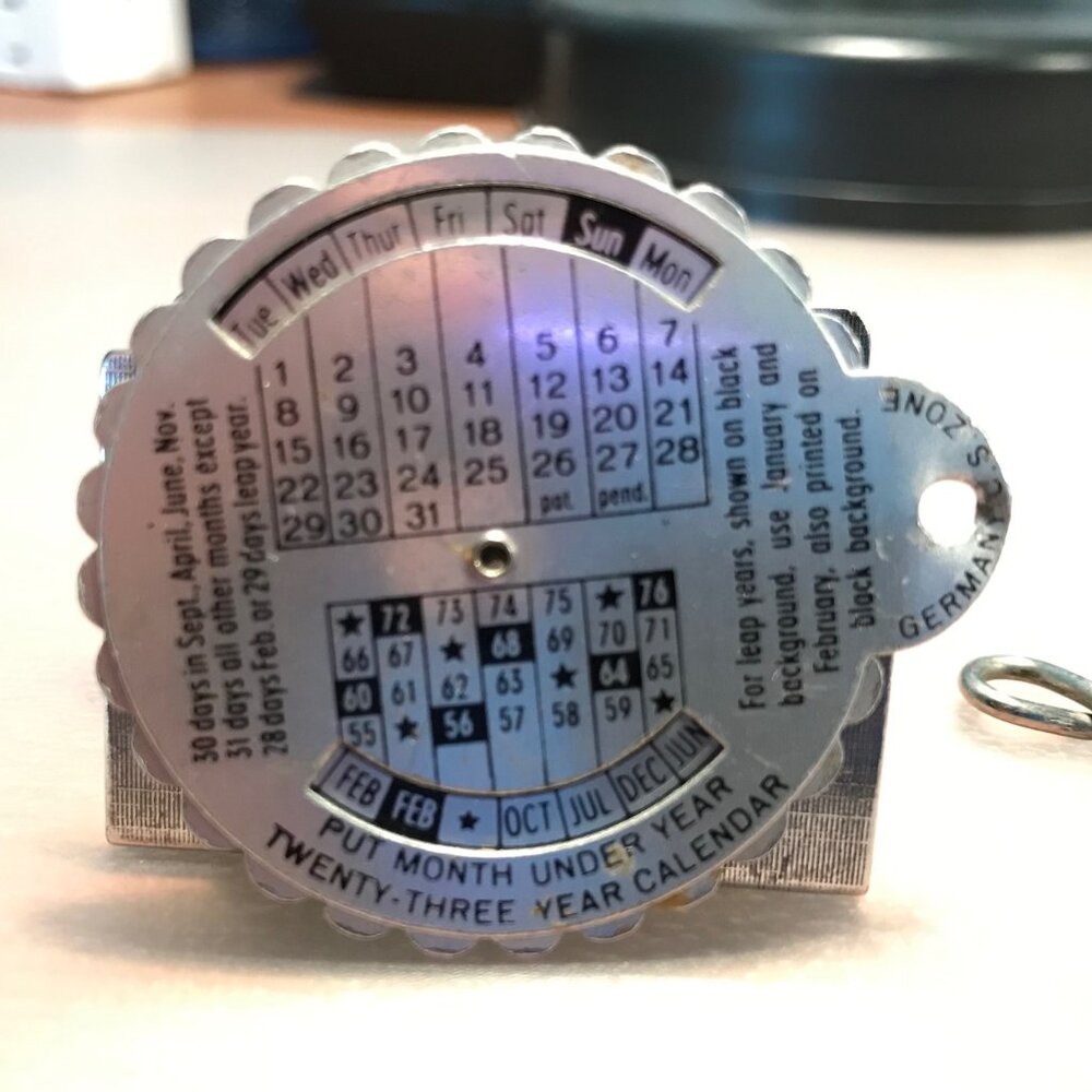 VINTAGE PERPETUAL POCKET METAL CALENDAR KEYCHAIN  from 1959